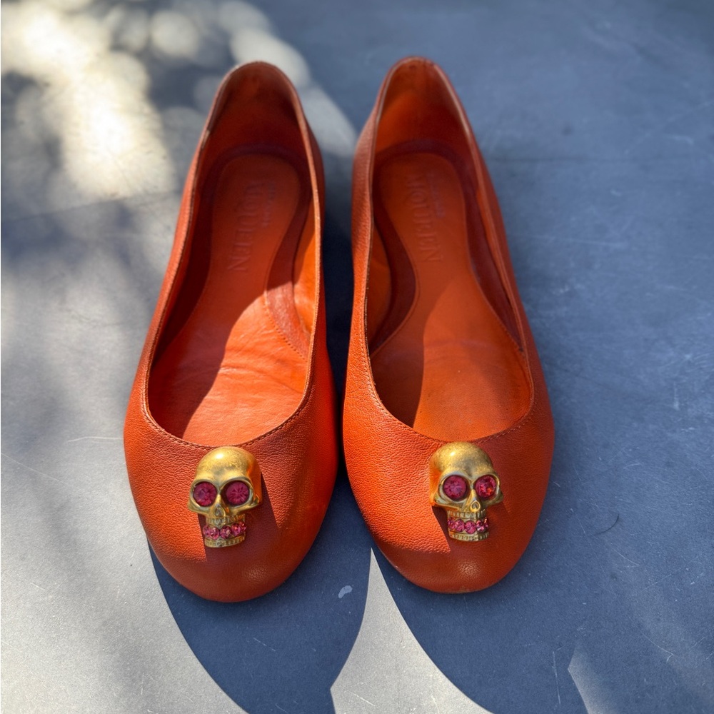 Alexander McQueen Orange Flats with Gold Skull Detail